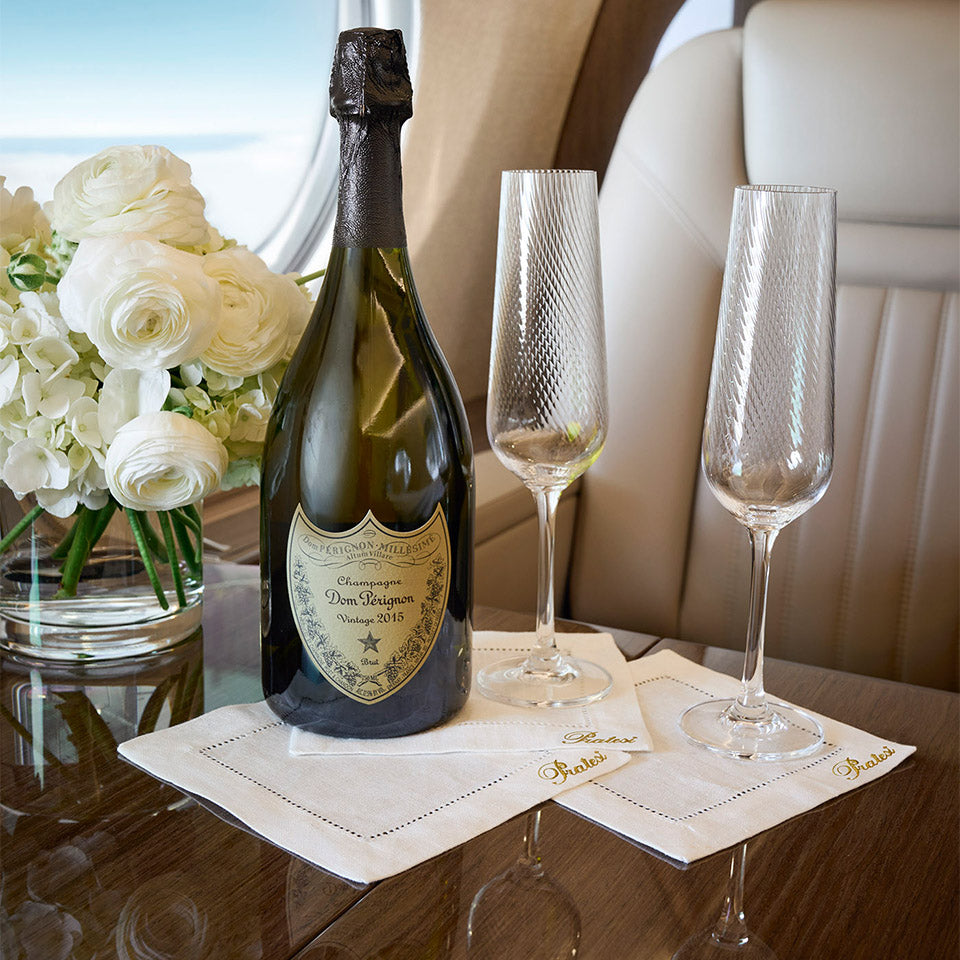 Pratesi custom table linens on private jet