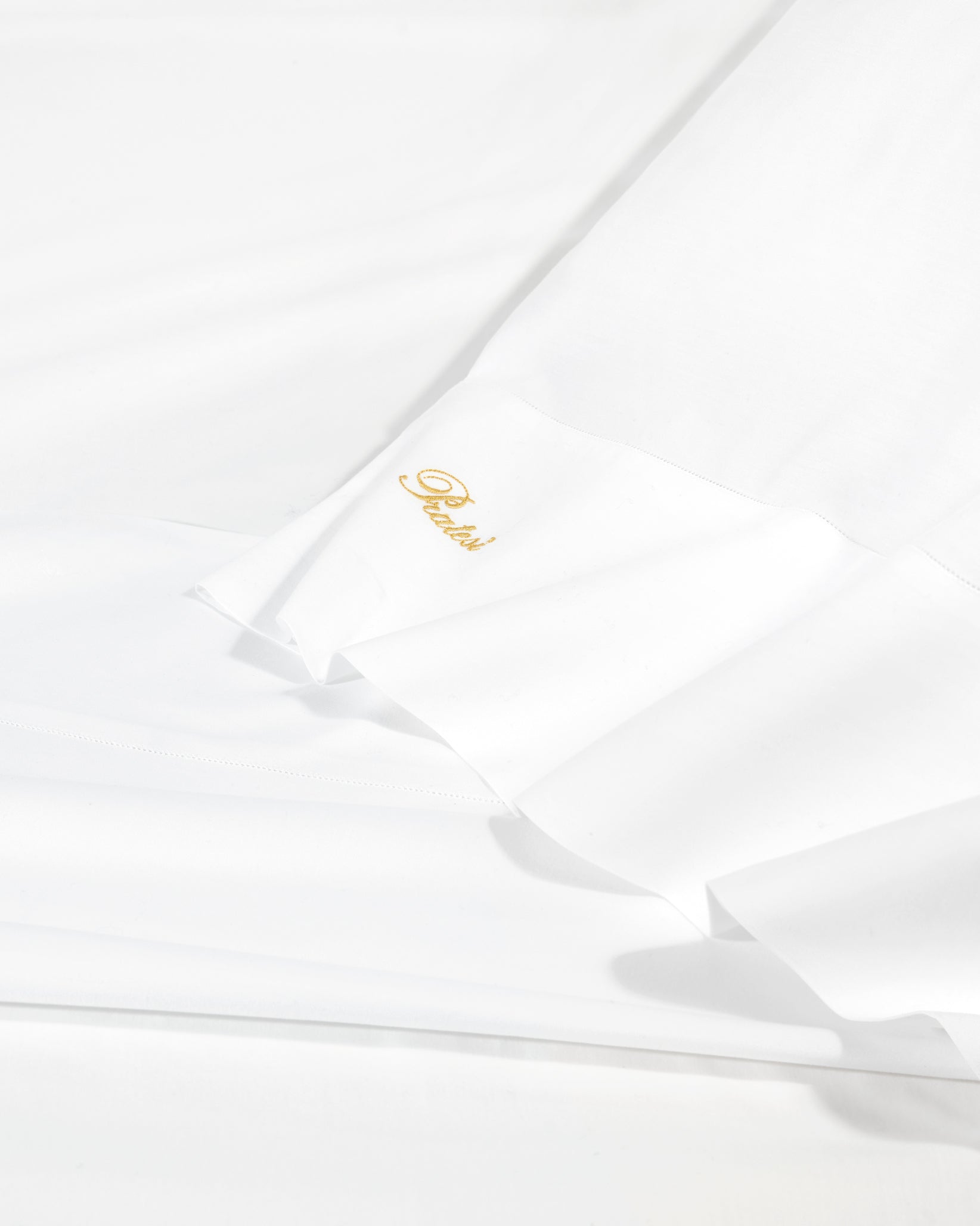Angel Luxe in white showing bedding texture.