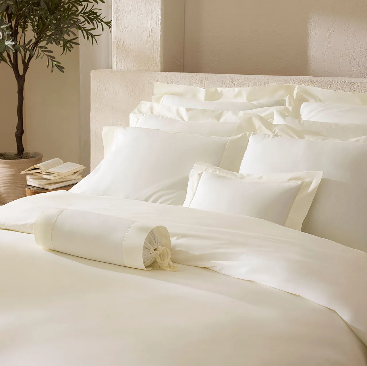 Angel luxe ivory close up of the shams, pillowcase and duvet cover