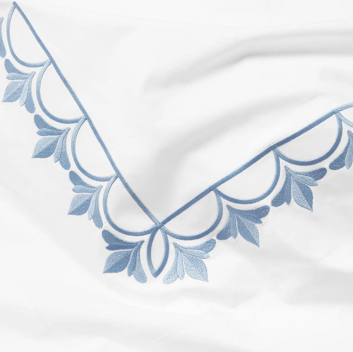 Arcata white/medium blue embroidery close up