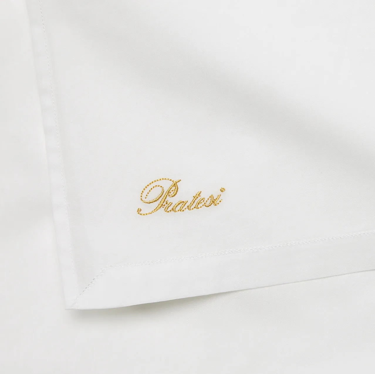 Angel Luxe white bed linens close up