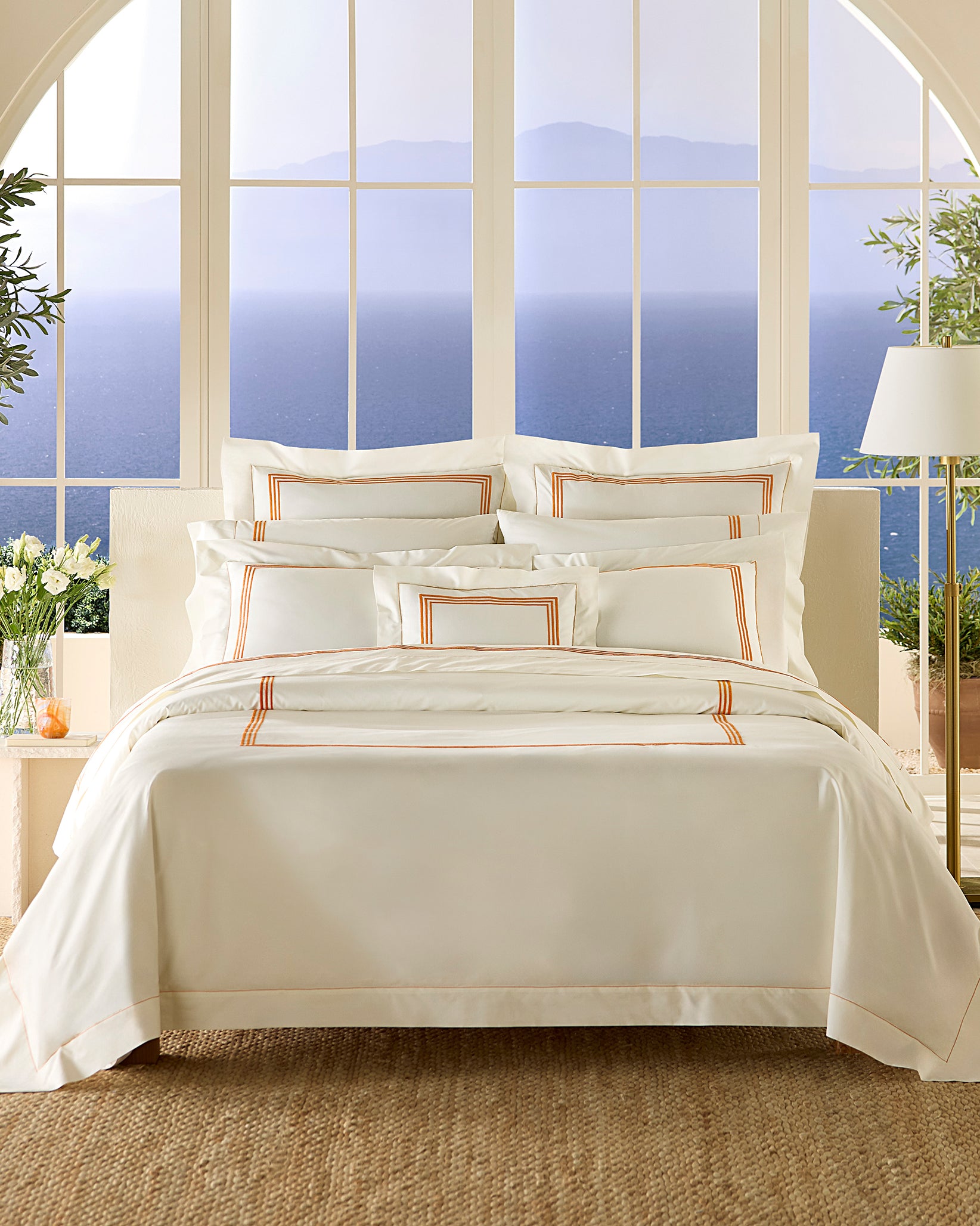 Tre Righe ivory/orange fully made bed