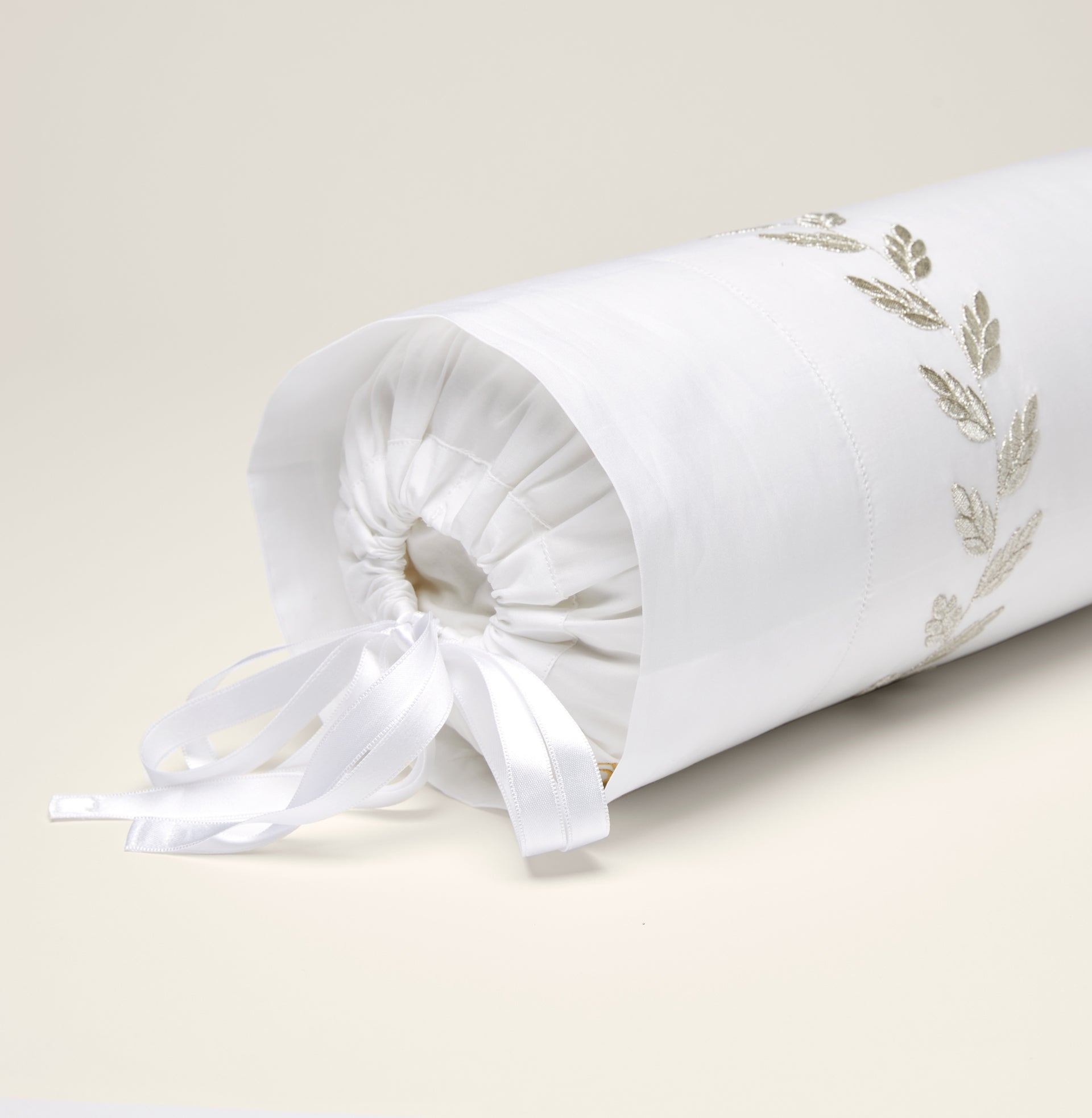Federico neckroll sham in white/antique silver