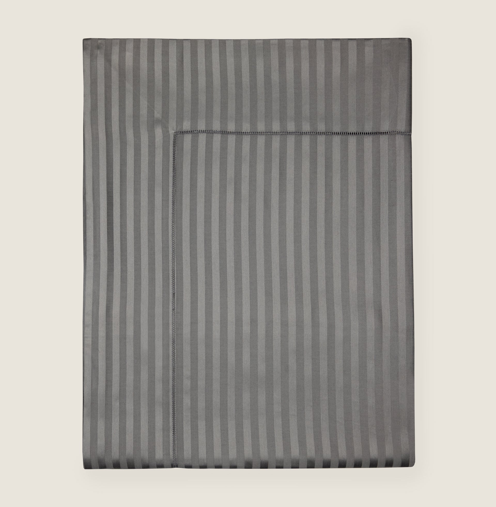 Raso Rigato flat sheet in charcoal folded