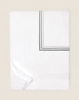 Tre Righe Ombre duvet cover folded in white/charcoal