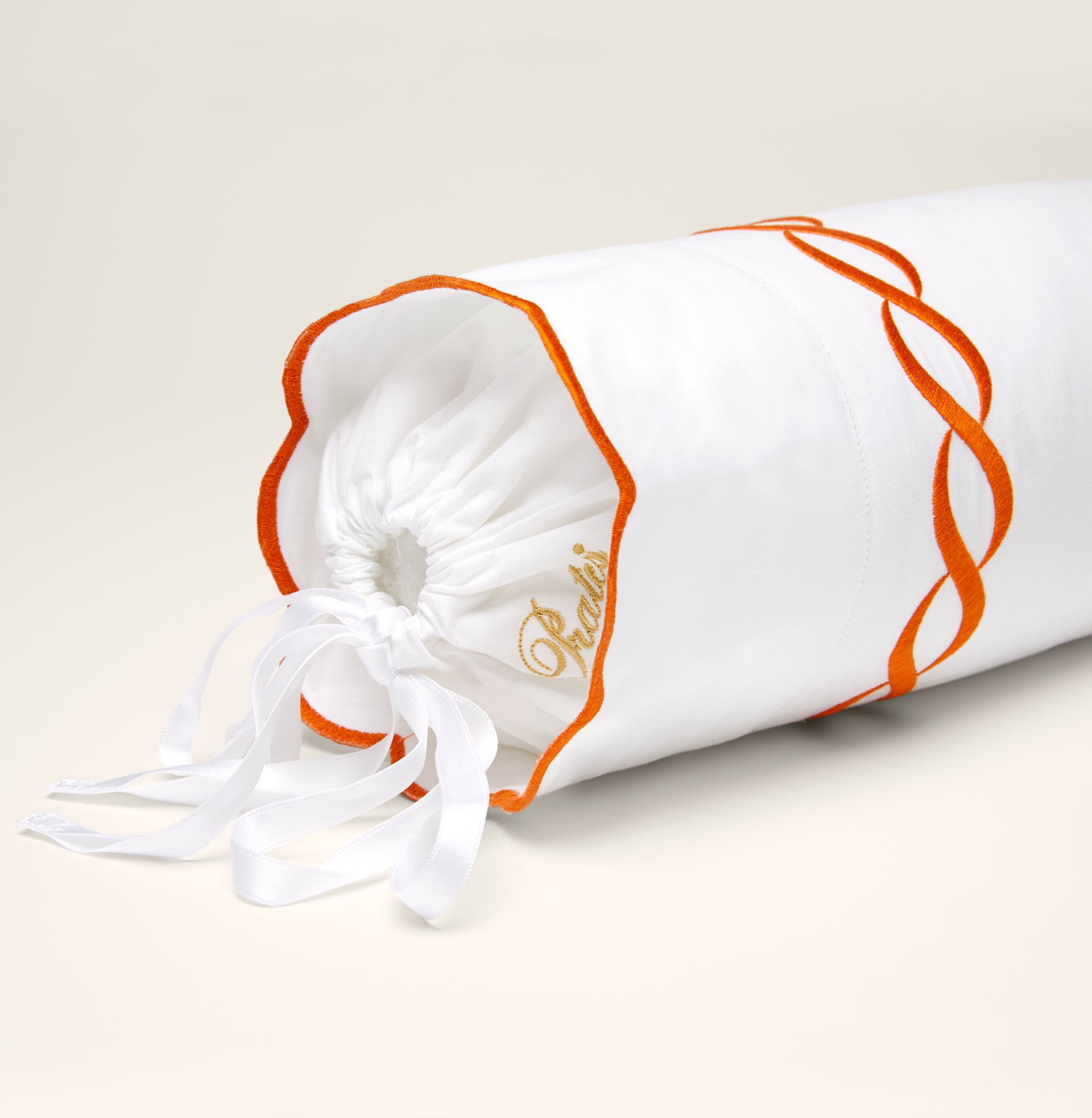 Treccia white/orange neckroll sham